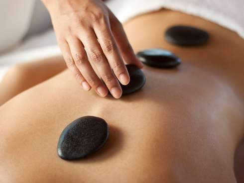 Image de la prestation LE MASSAGE AUX PIERRES CHAUDES AVEC SPA